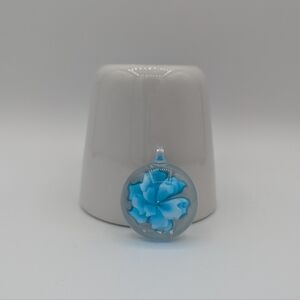 Blue flower pendant in resin